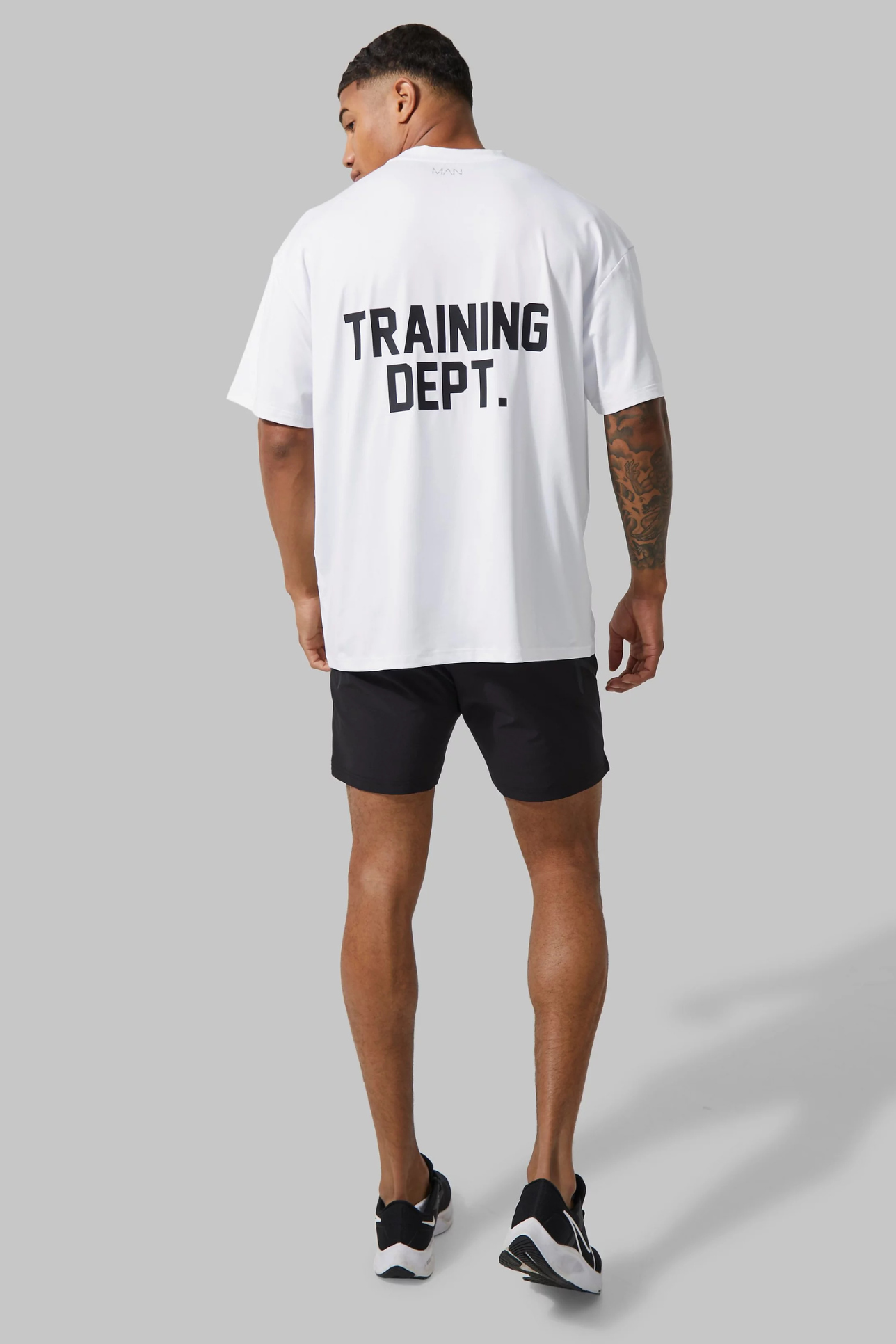 TRAINING DEPT. WHITE OVERSIZED T-SHIRT