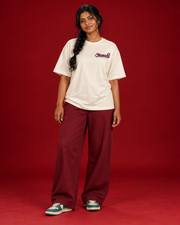 AMAITHI Tamil அமைதி offwhite tee small burgundy teal left chest print