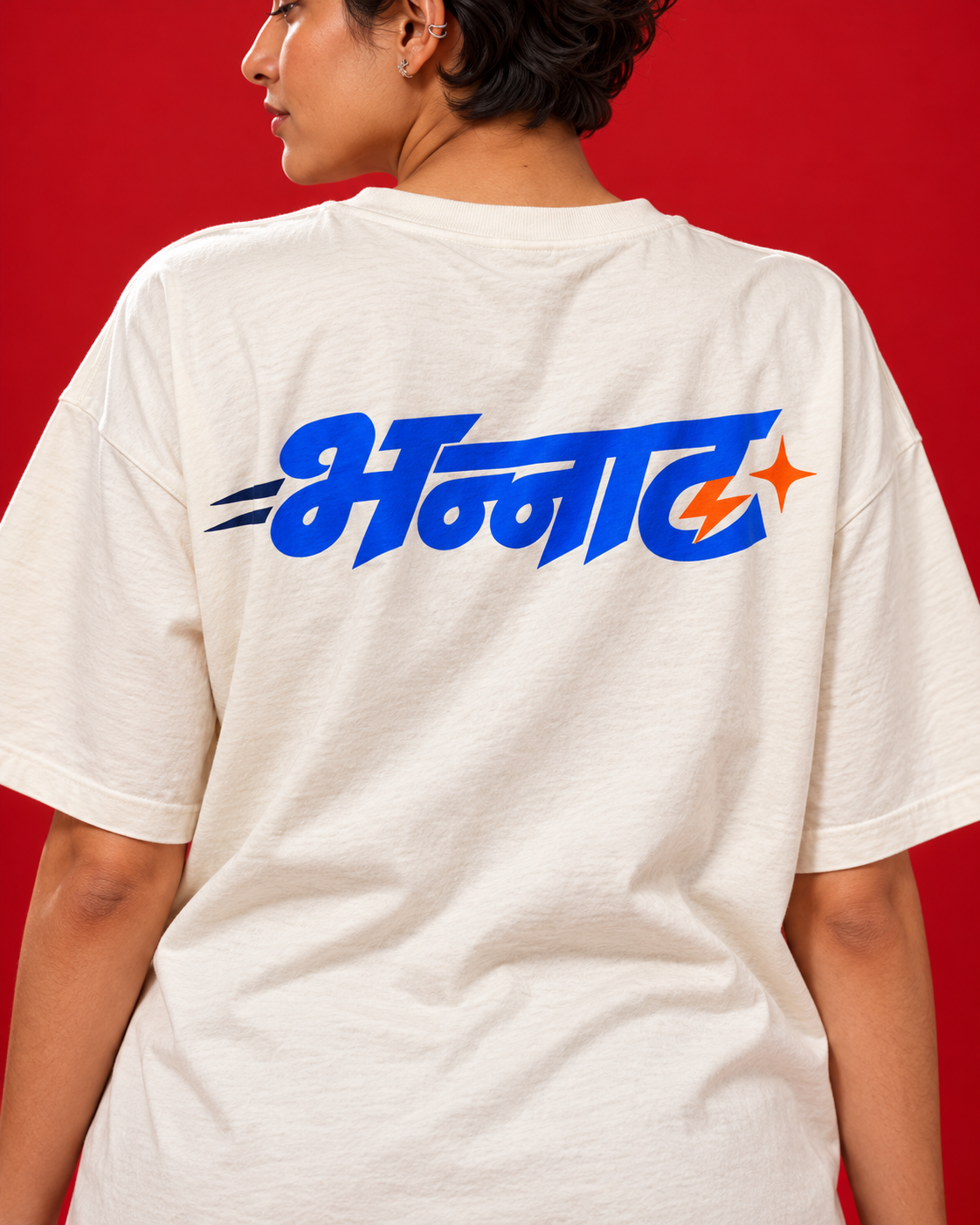 BHANNAT off-white oversized T-shirt back print close-up cobalt Marathi lettering orange lightning matte cotton texture
