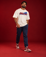 BUILT BY CONSISTENCY men's offwhite gym tee Side view