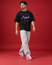 CALM IN CHAOS black trading tee walking three-quarter view