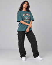 DRAMA DEPARTMENT WOMEN'S OVERSIZED T-SHIRT corrected three-quarter pose