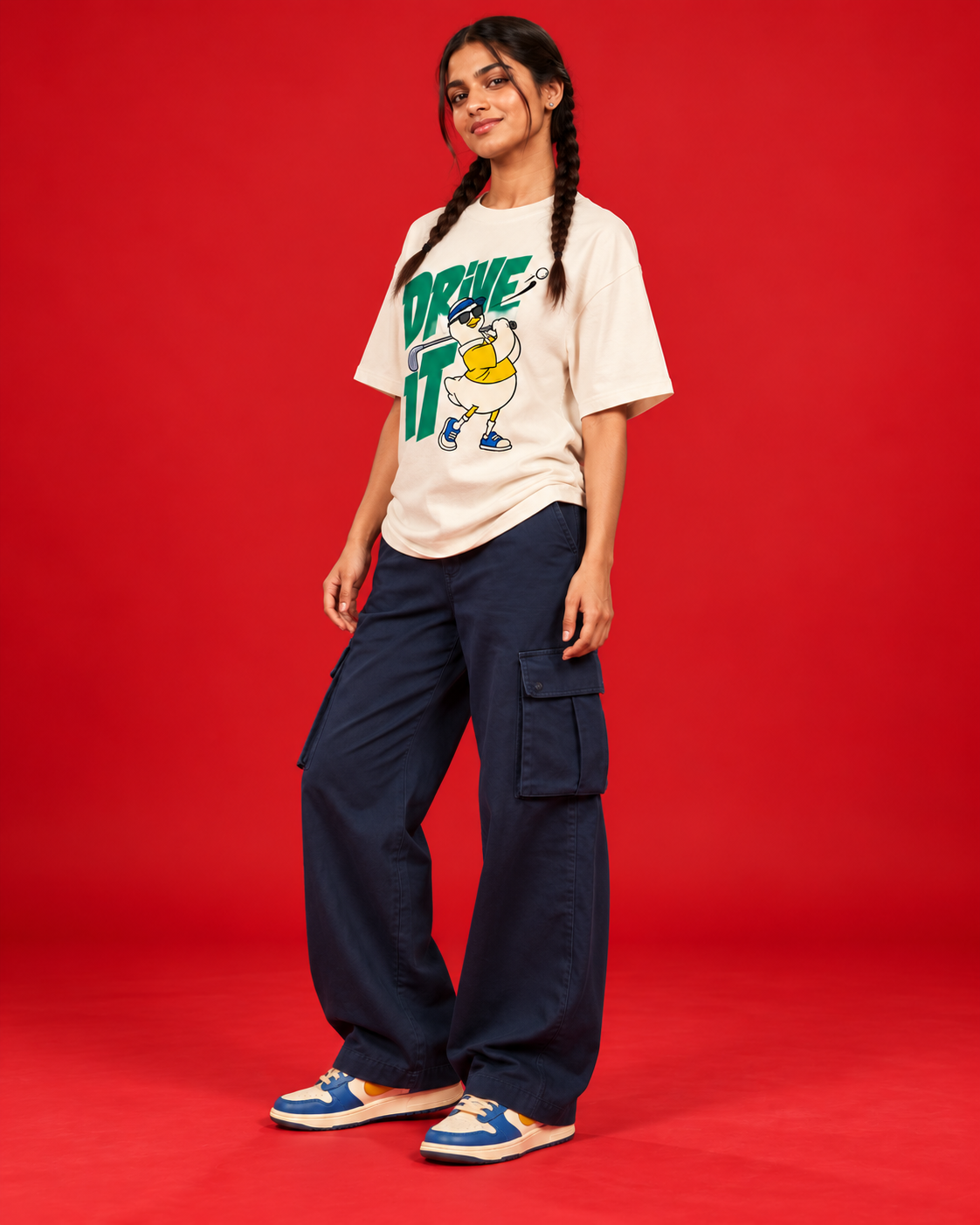 Drive It women's off-white oversized tee three-quarter side view green golf goose print