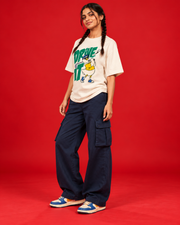 Drive It women's off-white oversized tee three-quarter side view green golf goose print