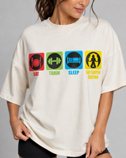EAT TRAIN SLEEP GO SUPER SAIYAN Women's Off White Oversized T-Shirt Close-Up View