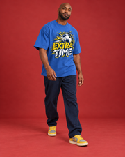 EXTRA TIME blue men's tee walking three-quarter view
