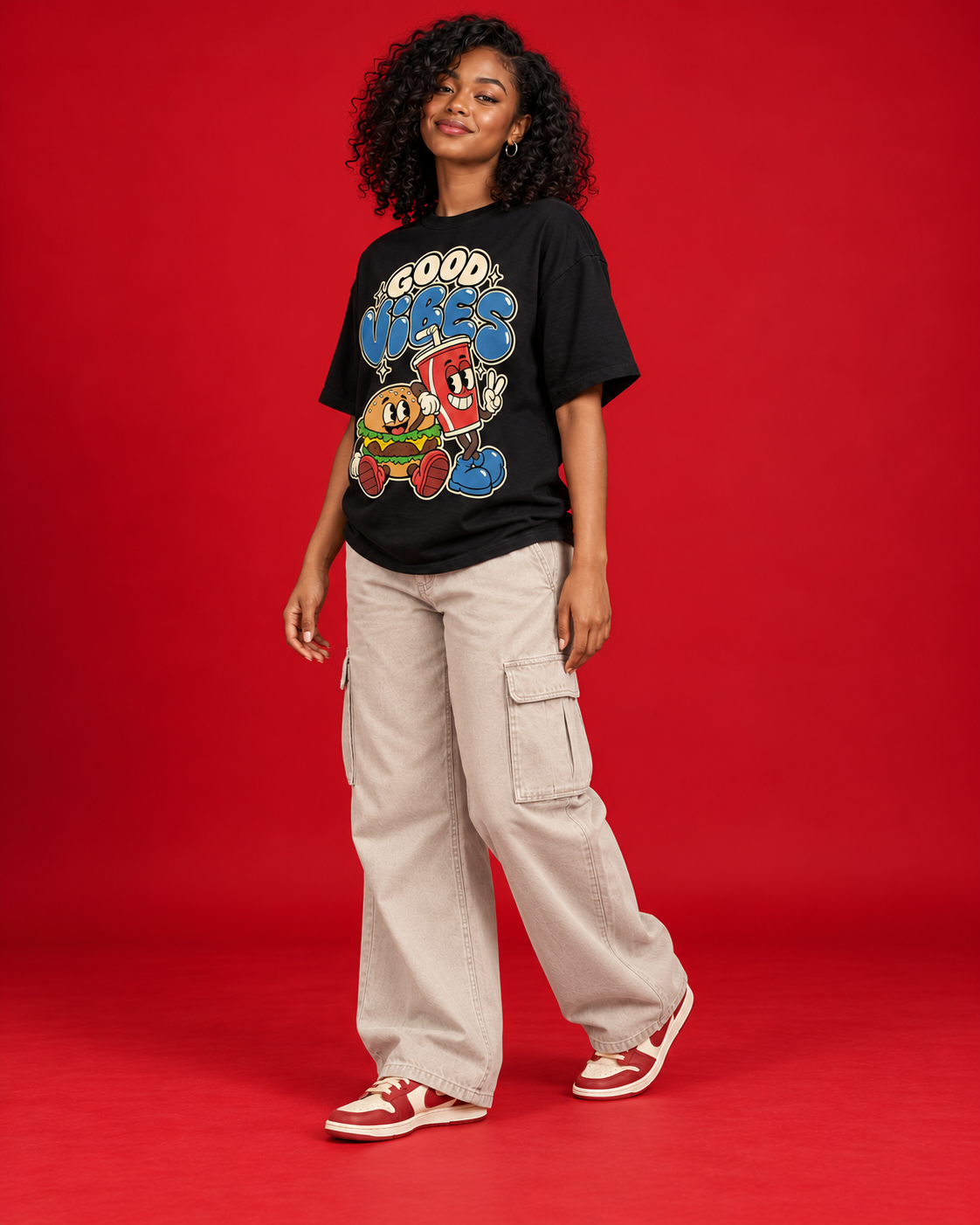 Good Vibes women's black oversized tee front three-quarter view retro burger cup illustration