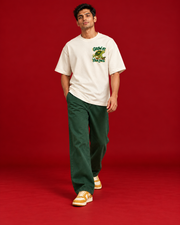 GROW AT YOUR PACE illustrated offwhite tee Side view