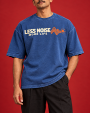 LESS NOISE MORE LIFE wide upper chest print close-up