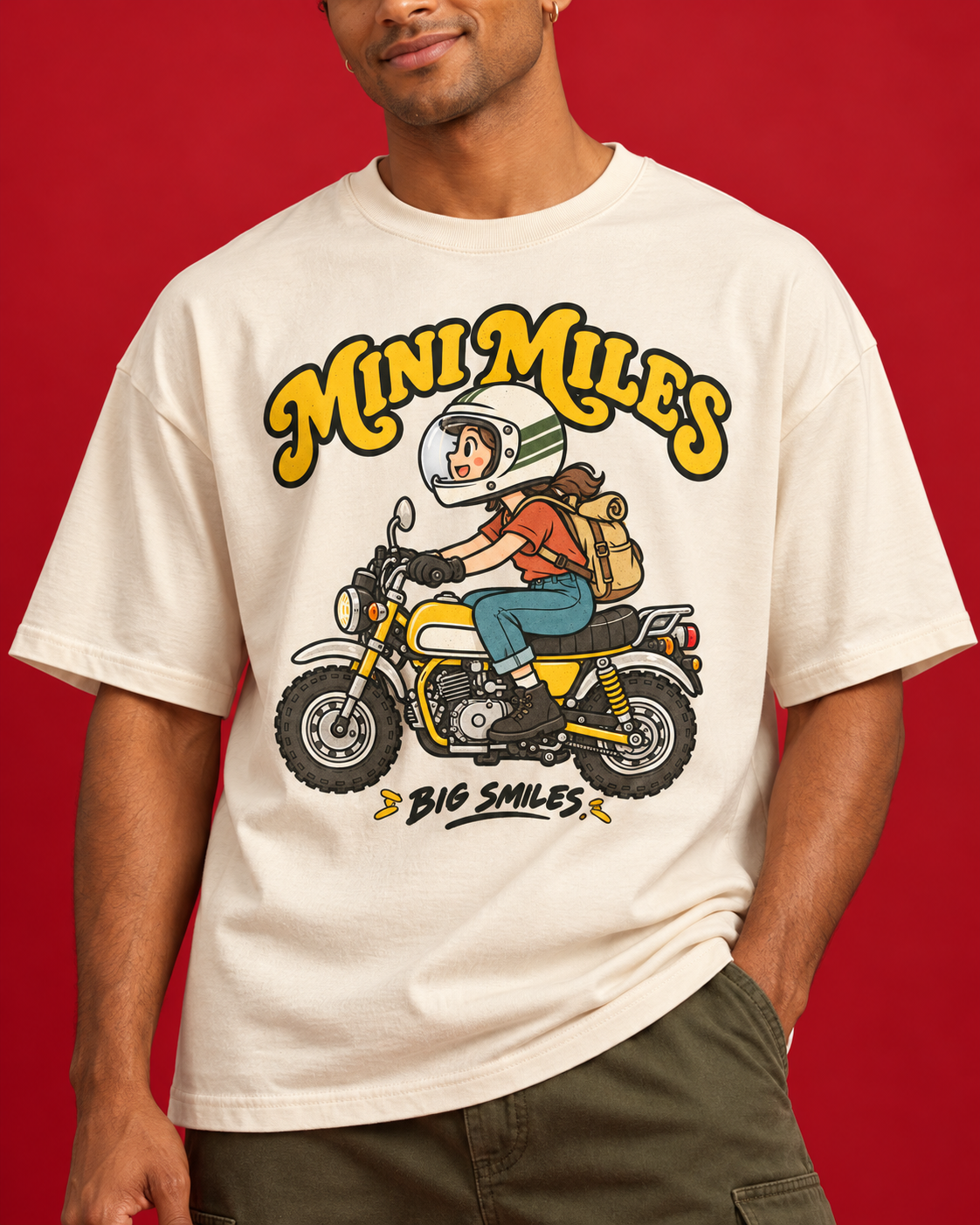 Mini Miles Big Smiles retro mini bike rider print close-up on off-white cotton
