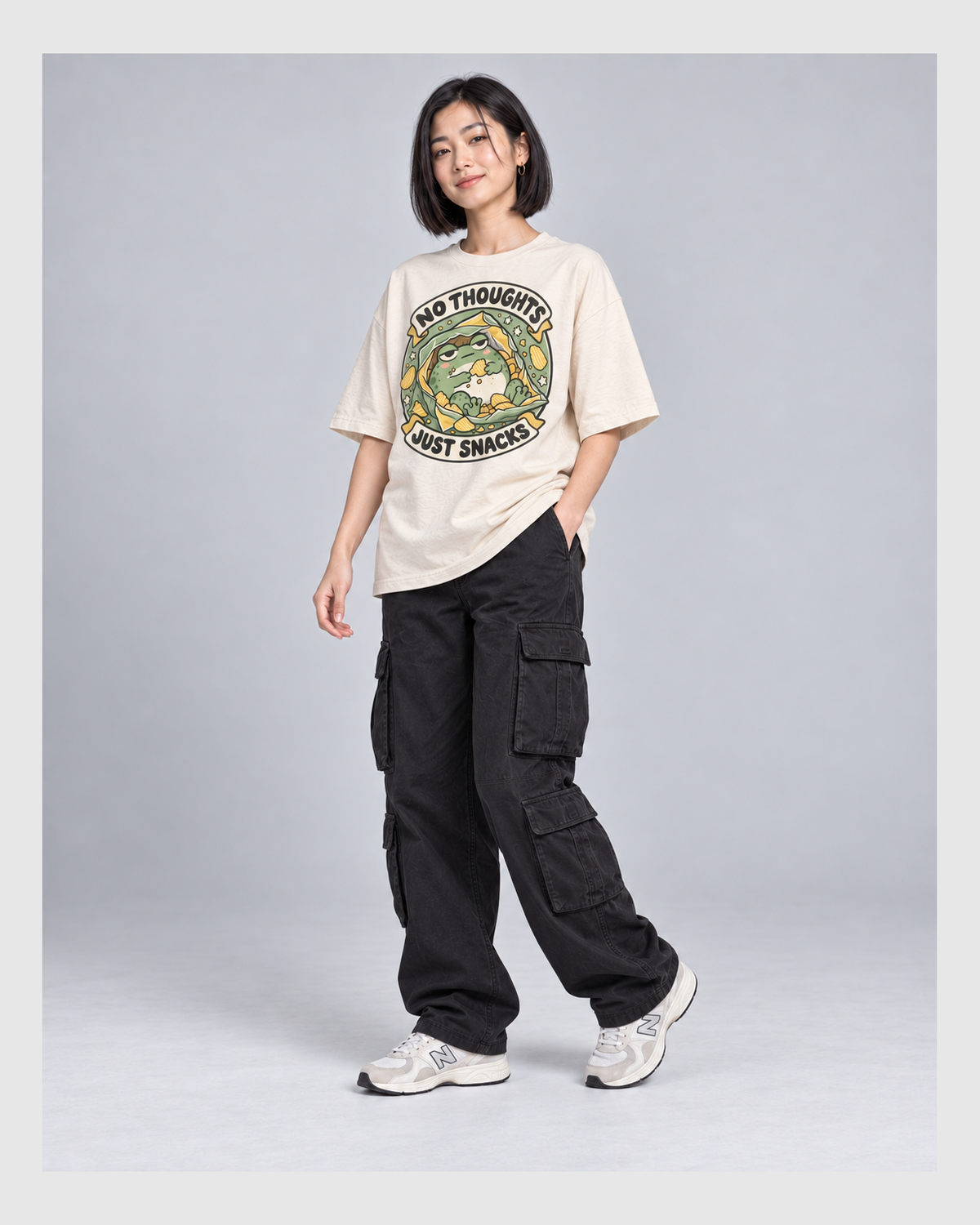 NO THOUGHTS JUST SNACKS OVERSIZED T-SHIRT three-quarter pose