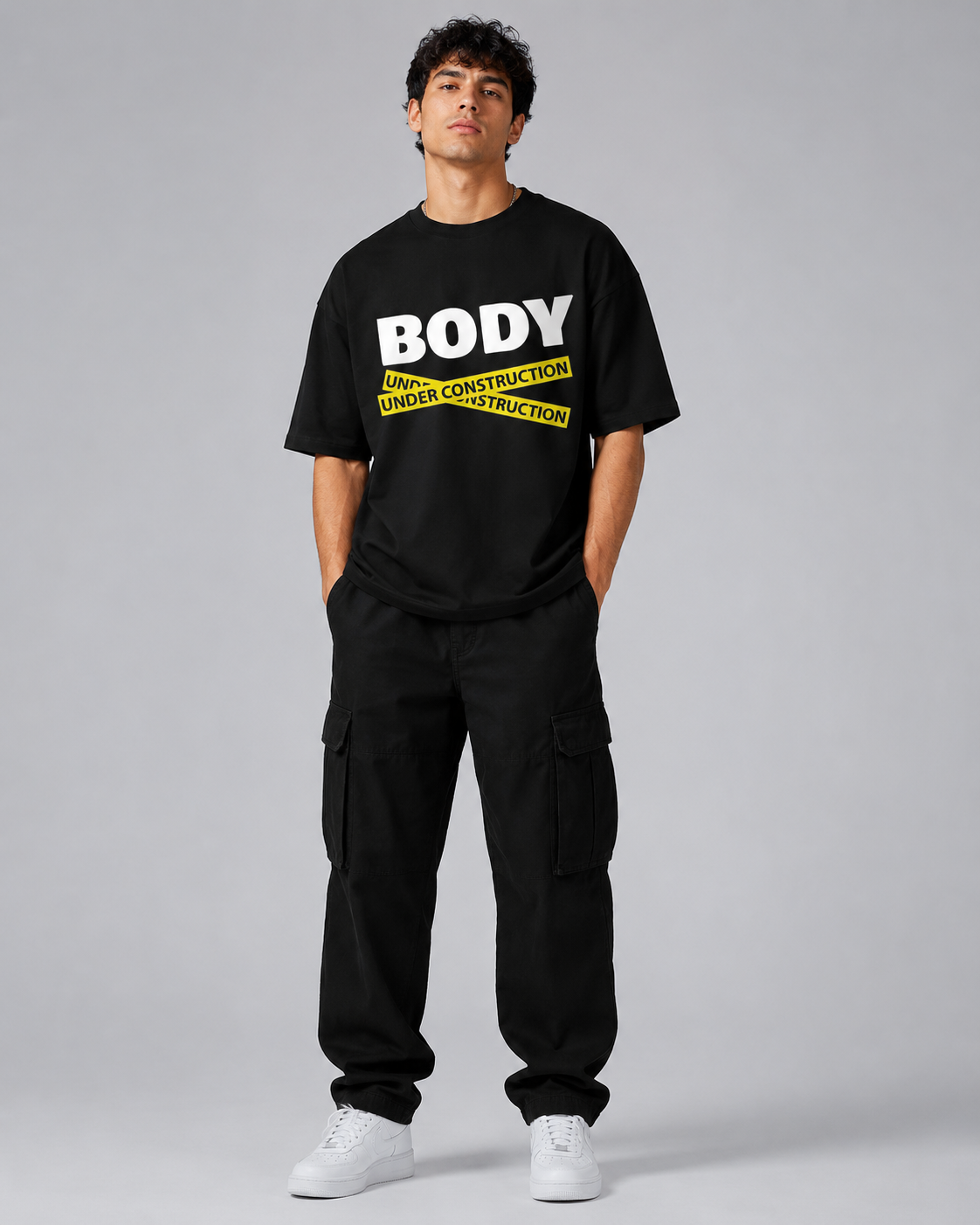 BODY UNDER CONSTRUCTION OVERSIZED T-SHIRT- BACK - premium oversized graphic T-shirt product image 3