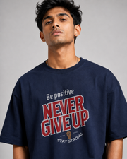 NEVER GIVE UP OVERSIZED T-SHIRT