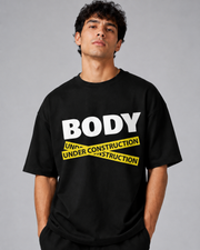 BODY UNDER CONSTRUCTION OVERSIZED T-SHIRT- BACK