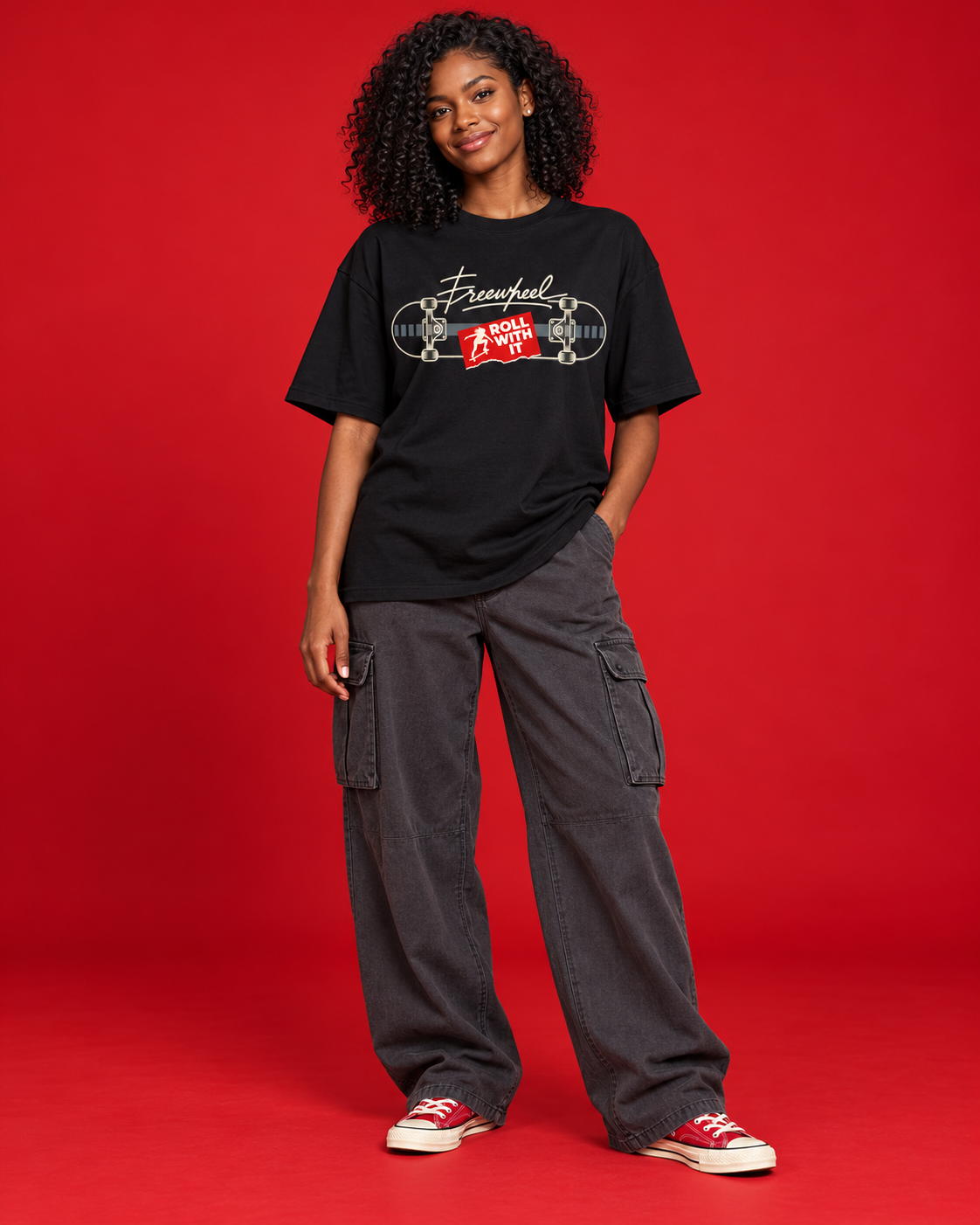 Roll With It women's black oversized tee compact Freewheel skateboard ivory line art red note front print