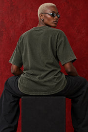 Plain back of olive oversized tee on seated model