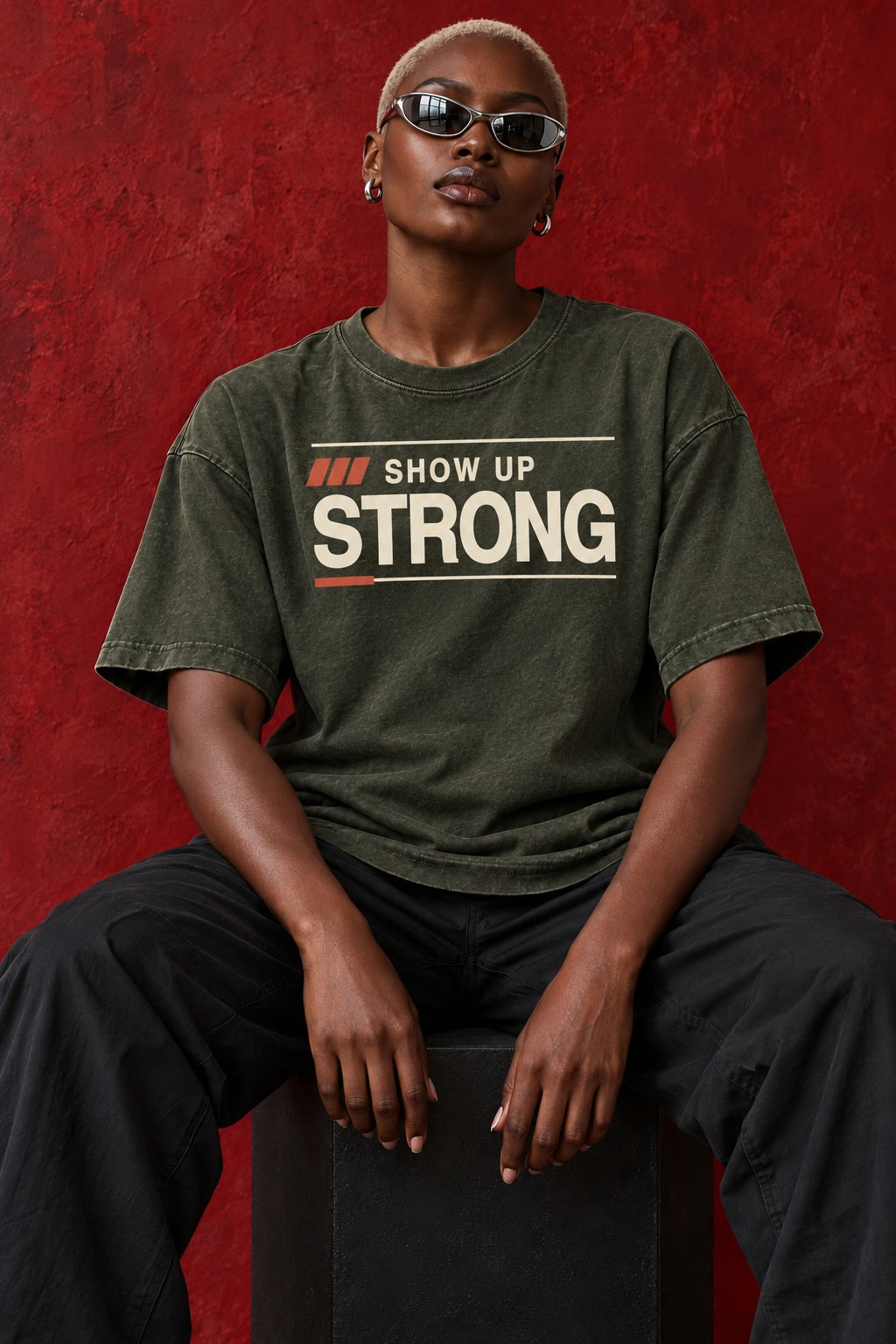 SHOW UP STRONG two-ink center chest graphic on olive oversized tee