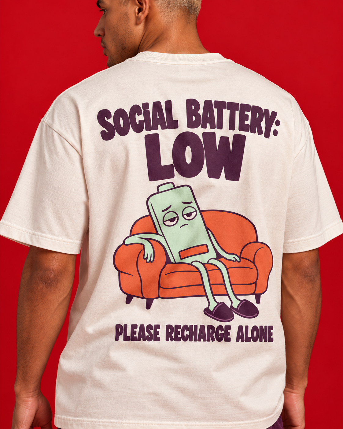 Social Battery Low off-white oversized T-shirt back print close-up tired mint battery coral sofa please recharge alone