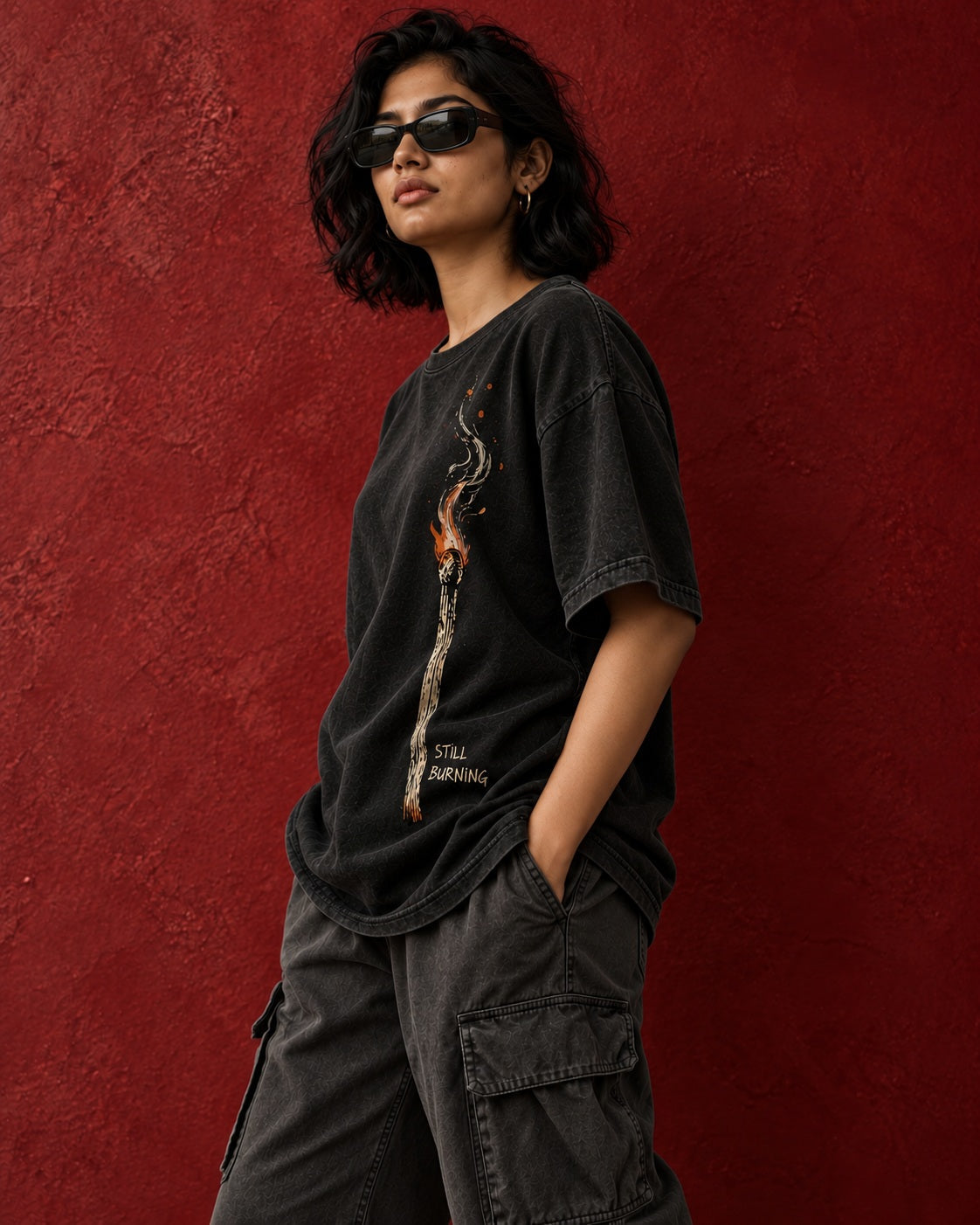 Side view of Still Burning oversized tee with natural print drape