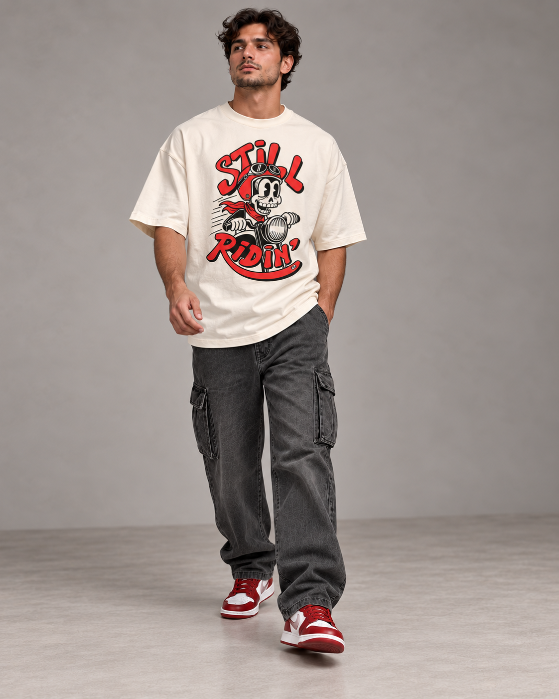 Still Ridin off-white oversized T-shirt natural walking pose