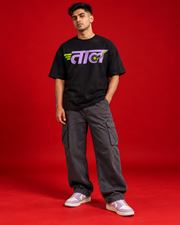 TAAL black oversized T-shirt lilac and lime Marathi music typography front view