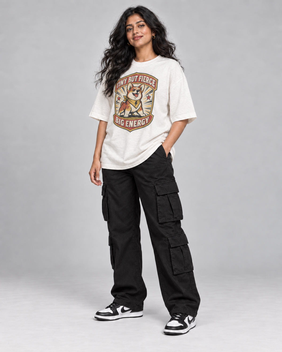 TINY BUT FIERCE WOMEN'S OVERSIZED T-SHIRT in Off White – three-quarter pose