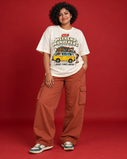 Weekend Wanderers women's off-white oversized tee front yellow camper van travel illustration